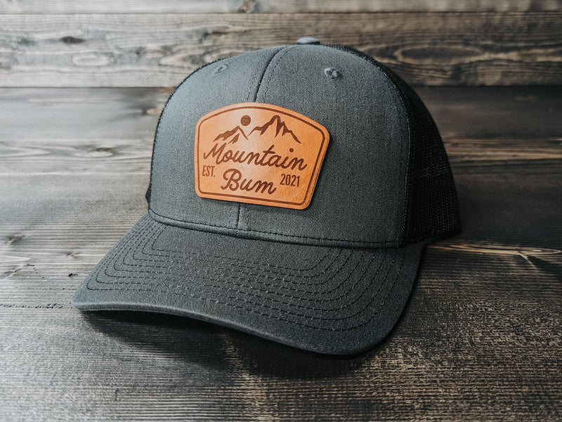 Mountain Bum: Leather Patch Trucker Hat - Wyo Dirt Customs