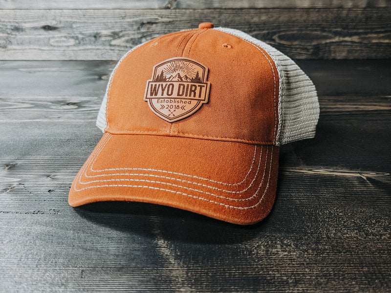 Wyo Dirt Badge: Leather Patch Trucker Hat - Wyo Dirt Customs