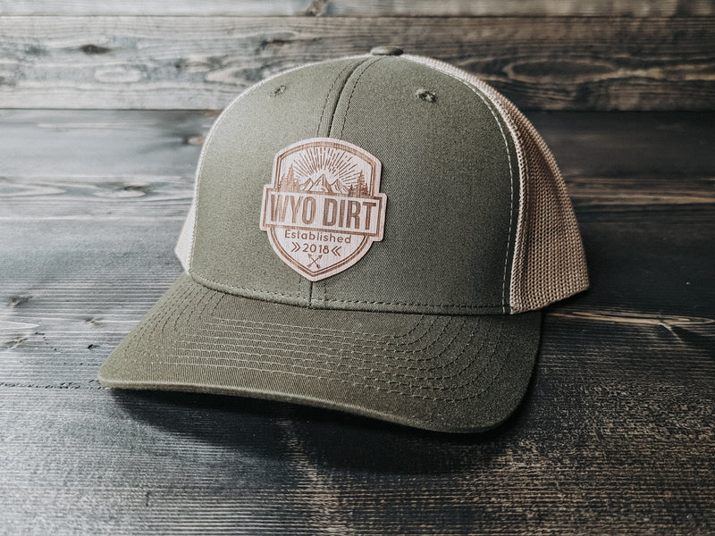 Wood Wyo Dirt Badge: Wood Patch Trucker Hat - Wyo Dirt Customs